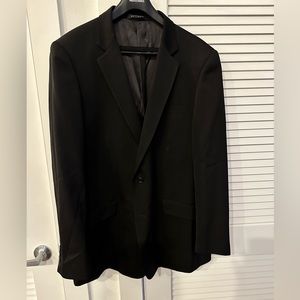 Black Italian men’s suit. No tailoring. 48L is the jacket. 43 pants.